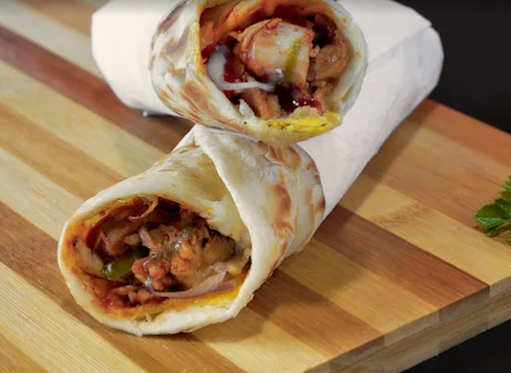 Chicken rolls on a wooden board